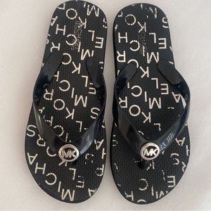 Michael Kors child’s flip flops